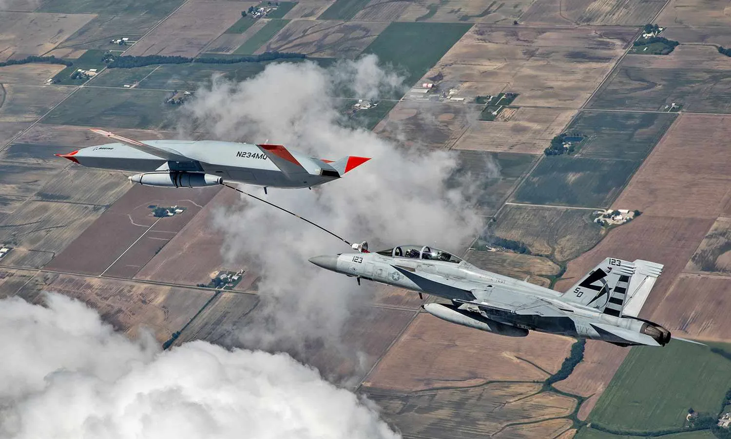 The MQ-25 drone refueling a F/A-18 fighter (Boeing)