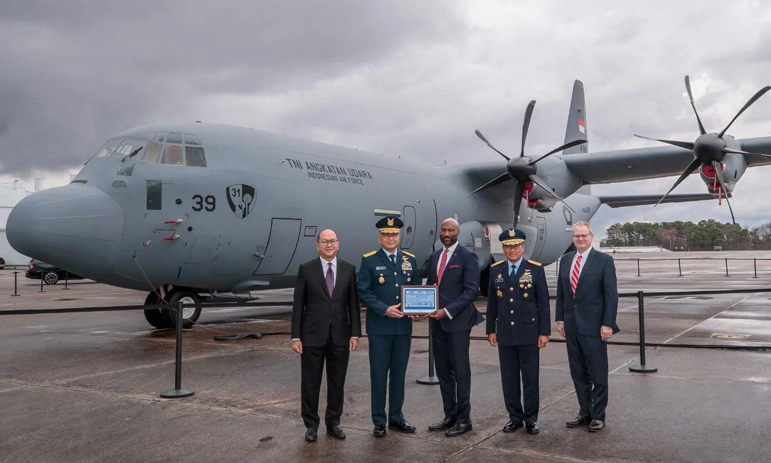 Members of the Indonesian Air Force receive the first C-130J-30 (LM)