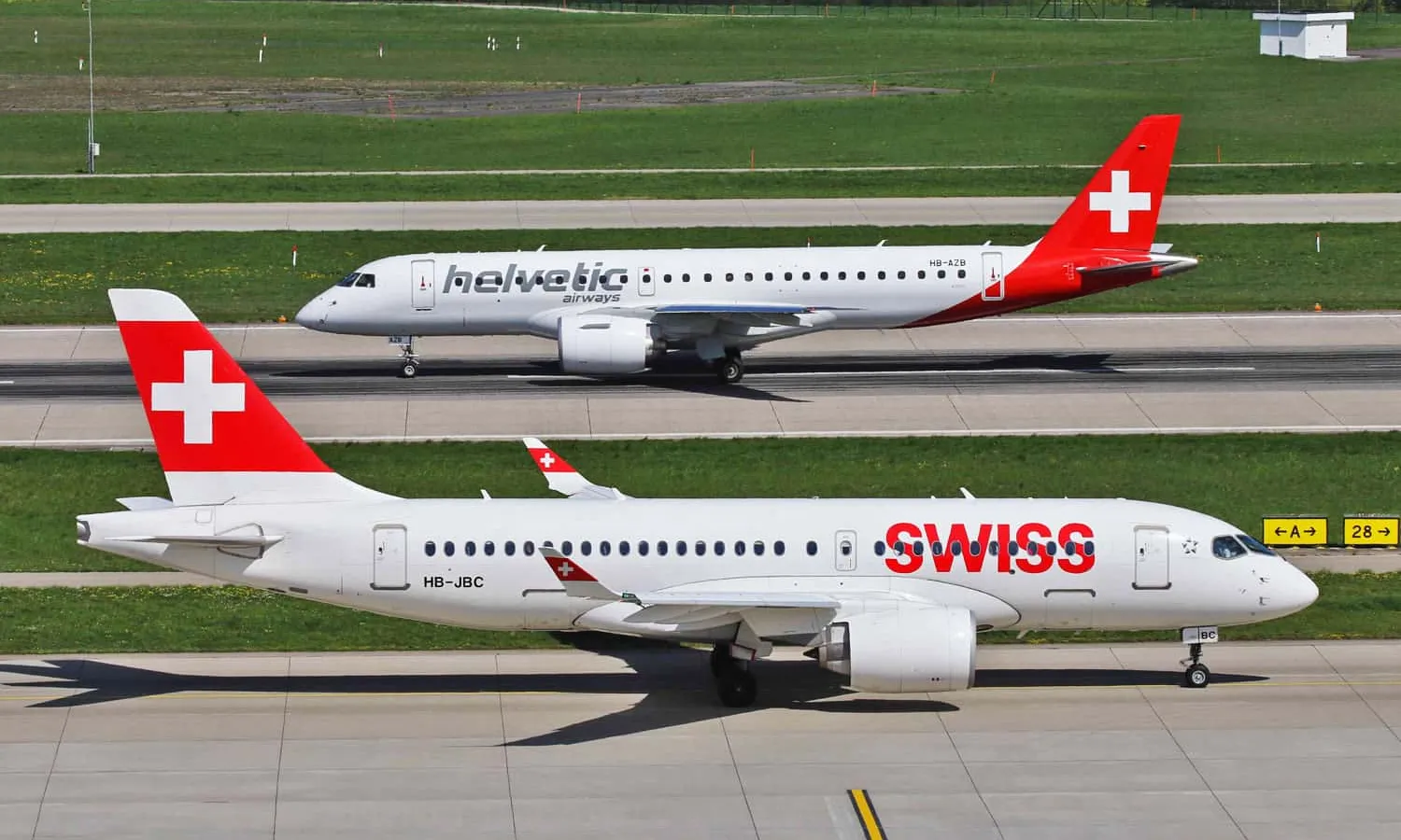 Helvetic Airways E190-E2 and a Swiss A220-100 (Swiss)